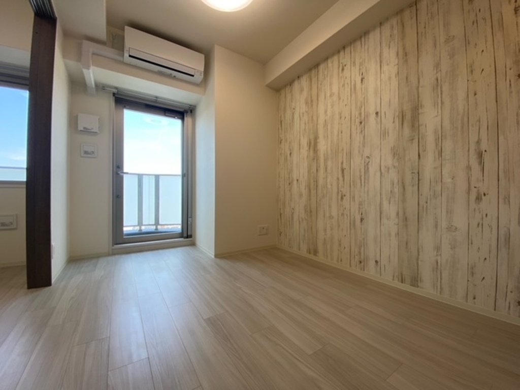 大阪府大阪市西淀川区歌島1丁目,プレサンス塚本アクミリオン1101号室のリビングに設置されているエアコン